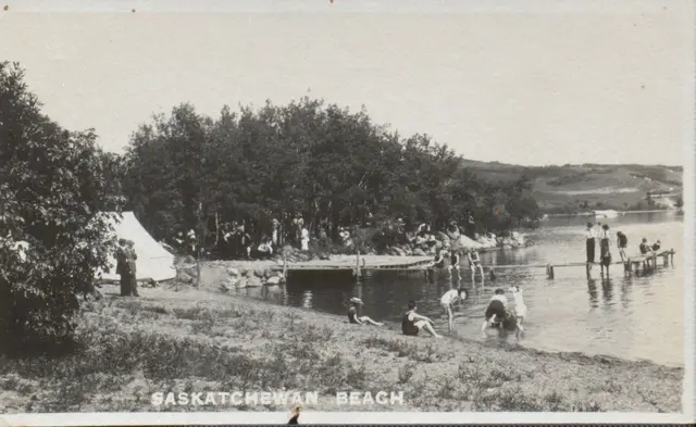 Bathers and pier at Saskatchewan Beach